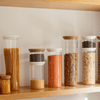 Assorted Coloured Lids of Glass Pantry Jars