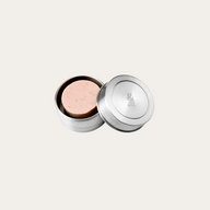 a tin with the label body with a body wash bar inside