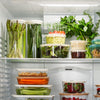 fridge filled with greens in jars