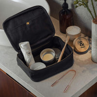 a toiletry bag full of personal care items